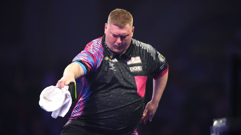 Ricky Evans celebrates victory during the round 2 match between Ricky Evans and Mark McGeeney on Day 8 of the 2020 William Hill World Darts Championship at Alexandra Palace on December 20, 2019 in London, England.