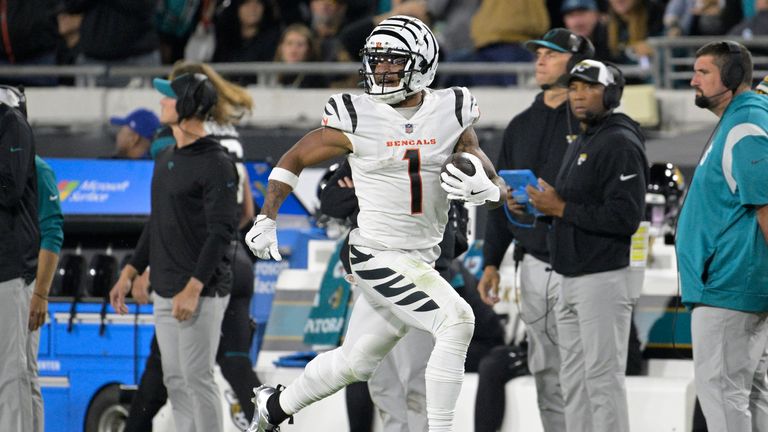 Cincinnati Bengals wide receiver Ja&#39;Marr Chase (1) runs for a touchdown during the second half of an NFL football game against the Jacksonville Jaguars, Monday, Dec. 4, 2023, in Jacksonville, Fla. 